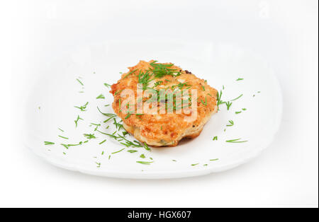 Cotoletta in una piastra isolata su bianco Foto Stock