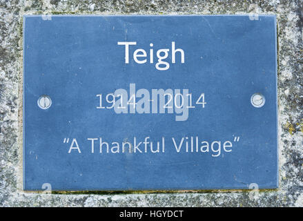 Una targa nel villaggio di Teigh, Rutland, Inghilterra, commemorando 100 anni come un 'Villaggio di ringraziamento' dal 1914 al 2014. Foto Stock