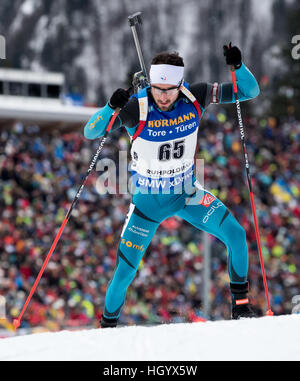 Ruhpolding in Germania. Xiii gen, 2017. L'atleta di biathlon Jean Guillaume Beatrix dalla Francia partecipa a uomini della 10 km sprint entro la Coppa del Mondo di Biathlon a Chiemgau Arena a Ruhpolding, Germania, 13 gennaio 2017. Foto: Sven Hoppe/dpa/Alamy Live News Foto Stock