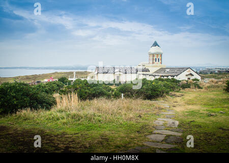 Bellissima chiesa cattolica a Seopjikoji, situato alla fine della sponda orientale dell'Isola di Jeju. 'Seopji' è il vecchio nome per l'area, e 'Koji' è Foto Stock