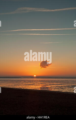 Tramonto sul lavare da Snettisham, Norfolk. Foto Stock