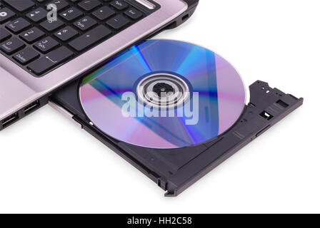 Portatile su sfondo bianco. Il disco DVD nell'unità. Percorso di clipping incluso. Foto Stock