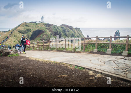 Jeju Island, Corea - 13 Novembre 2016 : La visita turistica di Faro, il bersaglio di treking in Seopjikoji. Si trova alla fine della riva orientale Foto Stock