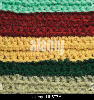 Maglia di lana indumento strisce colorate di sfondo texture naturali, giallo, beige, Claret, blu, verde sciarpa macro closeup, grande trama dettagliata Foto Stock