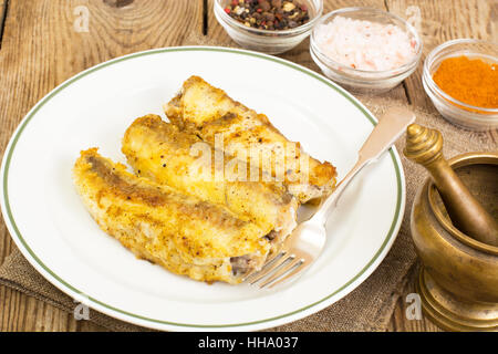 Pesce fritto nel pangrattato Foto Stock