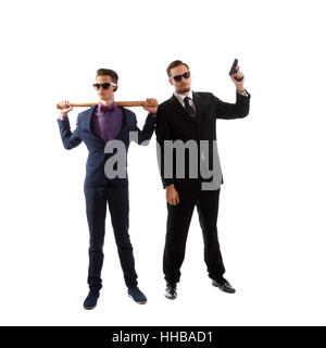 Un paio di ben vestito uomo armi di contenimento Foto Stock