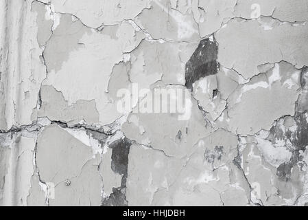 Intonaco incrinato texture. Vintage incrinato muro di cemento sullo sfondo Foto Stock