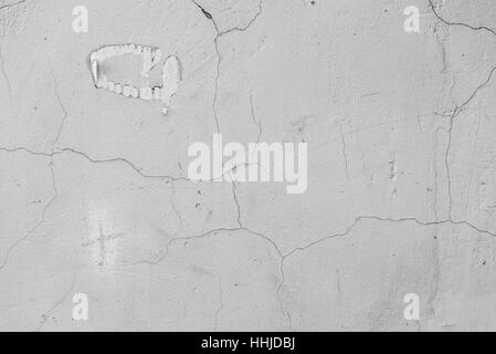 Calcestruzzo grunge muro di cemento con crack in edificio industriale, grande per il tuo design e texture di sfondo Foto Stock