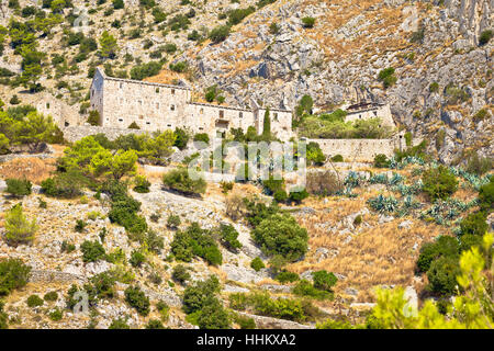 Abbandonato il villaggio di pietra di Brac Isola Desert, Dalmazia, Croazia Foto Stock