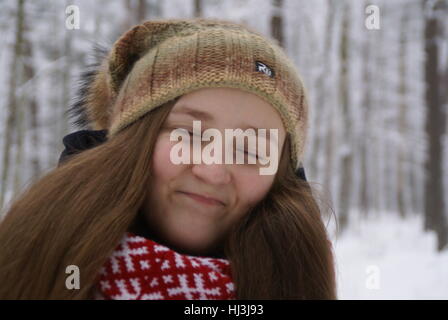 Una chiusura di un womans/ragazze faccia essendo felice. Foto Stock