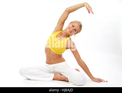 Giovane donna fa stretching Foto Stock