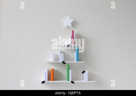 Albero di natale di scaffali di libri musicali Foto Stock