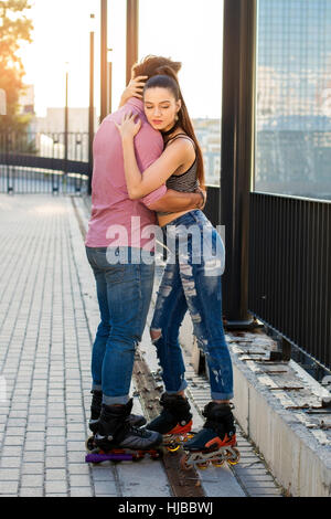 Persone con i pattini avvolgente. Foto Stock