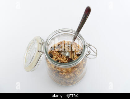Home muesli fatto in un vasetto di vetro Foto Stock