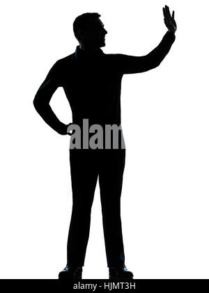 Un caucasian business man salutando silhouette permanente di lunghezza completa in studio isolato su sfondo bianco Foto Stock