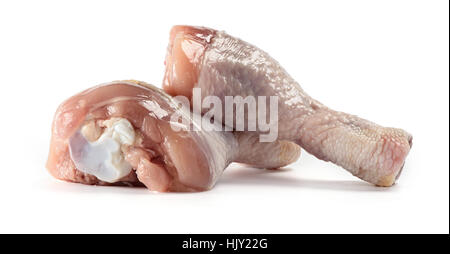 Il pollo crudo gambe su sfondo bianco isolato Foto Stock