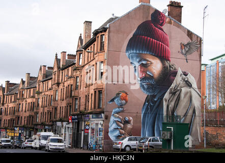 Spettacolare murale sul frontone in High Street Glasgow. Il dipinto raffigura un giorno moderno St Mungo - patrono di Glasgow. Foto Stock