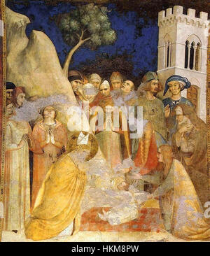 L'affresco *50bambino di San Martino* è un'opera storica raffigurante una scena religiosa o mitologica. Si tratta di un notevole esempio di tecniche di affreschi medievali, che mostrano colori vivaci e dettagli intricati. Questo affresco è ospitato in una chiesa o edificio storico e rappresenta lo stile artistico dell'epoca. Foto Stock