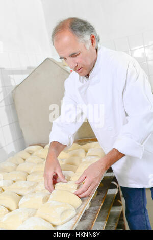 La preparazione di focacce di pane Foto Stock