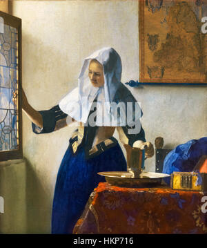 Vermeer. "Giovane Donna con una brocca di acqua' da Johannes Vermeer, olio su tela, c.1662. Foto Stock