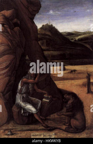 "San Girolamo nel deserto" di Giovanni Bellini raffigura il santo in un tranquillo paesaggio desertico, riflettendo temi di solitudine e devozione. Il dipinto ad olio è un bell'esempio di arte rinascimentale veneziana. Foto Stock