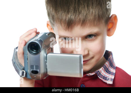 Ragazzino con una telecamera bianco isolato Foto Stock