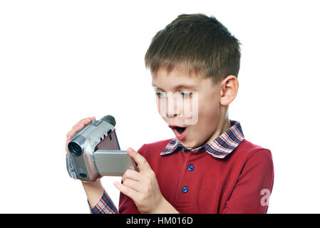 Ragazzino con una telecamera bianco isolato Foto Stock