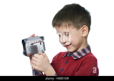 Ragazzino con una telecamera bianco isolato Foto Stock