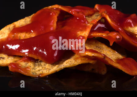 Nachos con pomodoro salsa piccante è uno snack dal Messico del Nord Foto Stock