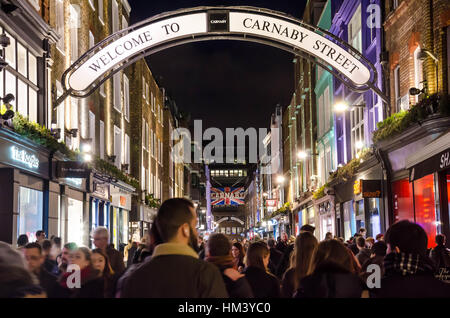 Carnaby Street nel West End di Londra di notte. Foto Stock