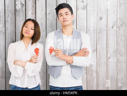 Triste giovane azienda cuore spezzato Foto Stock