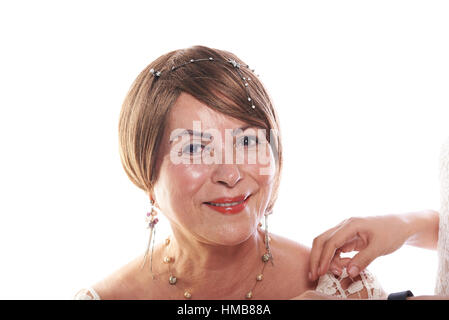 Make up di donna matura isolata su sfondo bianco Foto Stock