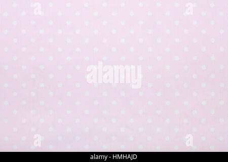 Pink polka dot fabric background texture Foto Stock