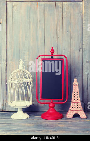 Home decor,lavagna con birdcage decorazione Foto Stock