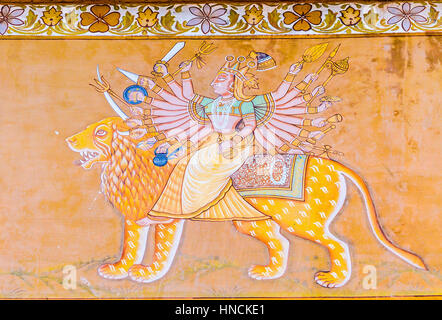 Un affresco al di fuori del Forte Mehrangarh raffigurante la dea Indù Durga. Foto Stock