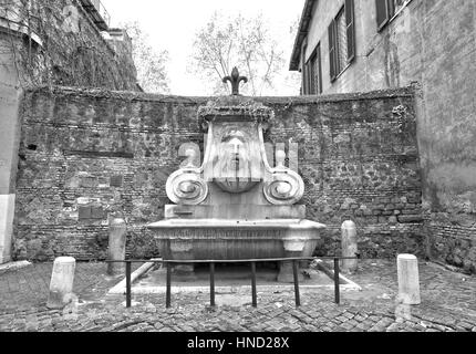 Fontana del Mascherone (Mascherone di Fontana) in Roma, Italia. Foto Stock