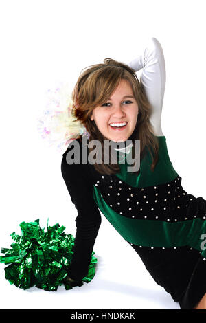 Teen girl in pom uniforme Foto Stock