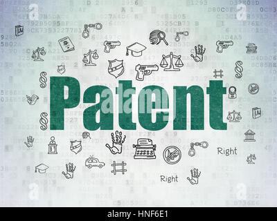 Il concetto di legge: verniciato di verde il brevetto di testo sui dati digitali carta con sfondo disegnato a mano le icone di legge Foto Stock