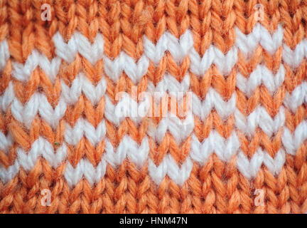 Texture arancione tessuto a maglia Foto Stock