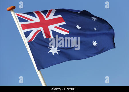 Bandiera australiana battenti nel vento Foto Stock