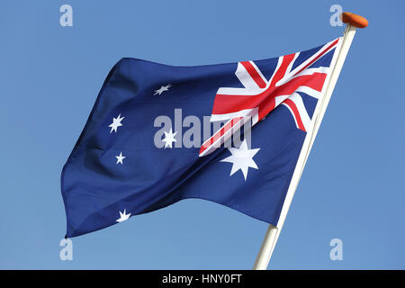 Bandiera australiana battenti nel vento Foto Stock