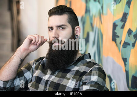 Uomo con barba hipster, ritratto Foto Stock