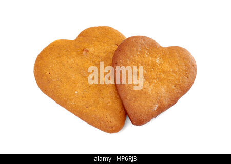 Due a forma di cuore ad gingerbread cookie su bianco Foto Stock