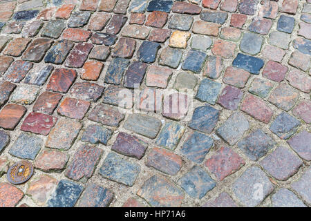 Vecchio colorato scuro strada acciottolata foto di sfondo Foto Stock