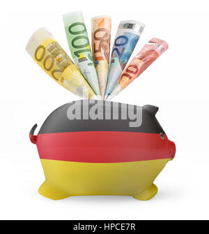 Vista laterale di un salvadanaio con il design di bandiera della Germania e varie banconote europee.(serie) Foto Stock