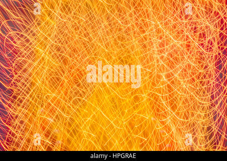 Abstract di luce giallo arancione Colous linee curve dello sfondo. Foto Stock