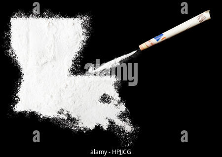 Un farmaco in polvere come la cocaina in forma di Louisiana con un laminato bill denaro.(serie) Foto Stock