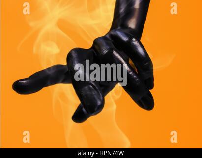 Puntando la mano nera Foto Stock