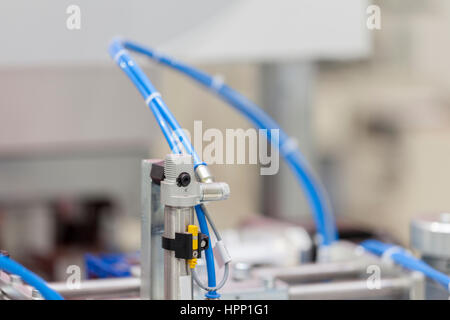 Pistone pneumatico sulla macchina, chiudere fino Foto Stock