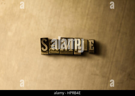 Campione - close-up di grungy vintage parola stampate su uno sfondo di metallo. Royalty free stock illustrazione. Possono essere utilizzati per gli annunci tramite banner on line di altezza e direct mai Foto Stock